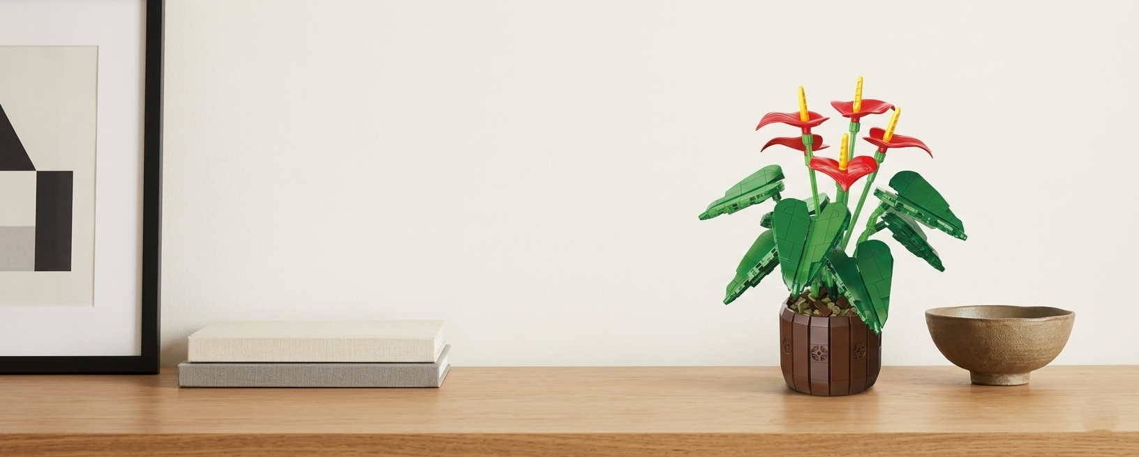 A minimalist Mavirea Anthurium building block bonsai on a sleek wooden shelf, perfectly blending realistic red blooms with a modern, clean interior style.