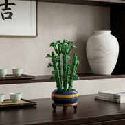 Minimalist shelf styling featuring the Mavirea Gourd Bamboo Bonsai brick-built plant, positioned alongside a white ceramic vase and tea set to create a sophisticated, maintenance-free decorative corner.