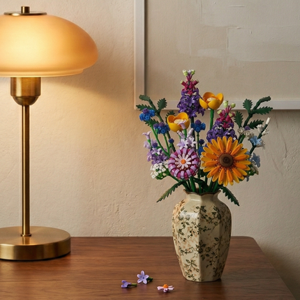A romantic evening setting showcasing the Mavirea Hoshino Hana Collection in a floral patterned vase, beautifully illuminated by the warm glow of a desk lamp, perfect as a thoughtful eternal gift.