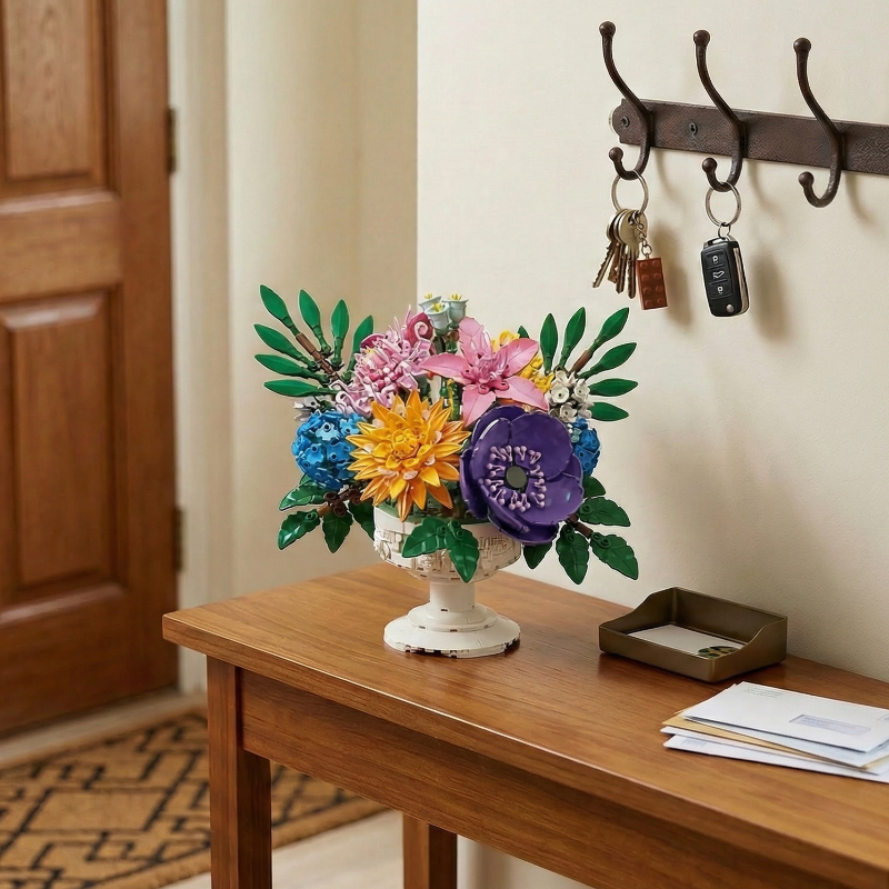 Mavirea eternal building block flowers displayed on an entryway console table, adding a welcoming and stylish touch to the home's foyer.