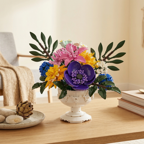 A Mavirea building block flower bouquet in a white ornate vase, serving as a vibrant centerpiece on a wooden coffee table in a cozy living room.