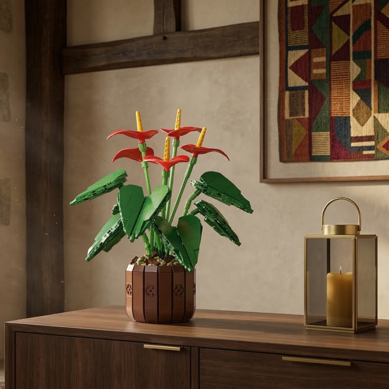 The Mavirea Anthurium Bonsai building block flower styled with a gold candle lantern and a colorful geometric tapestry, highlighting the product as a thoughtful and "eternal greenery" gift for any occasion.