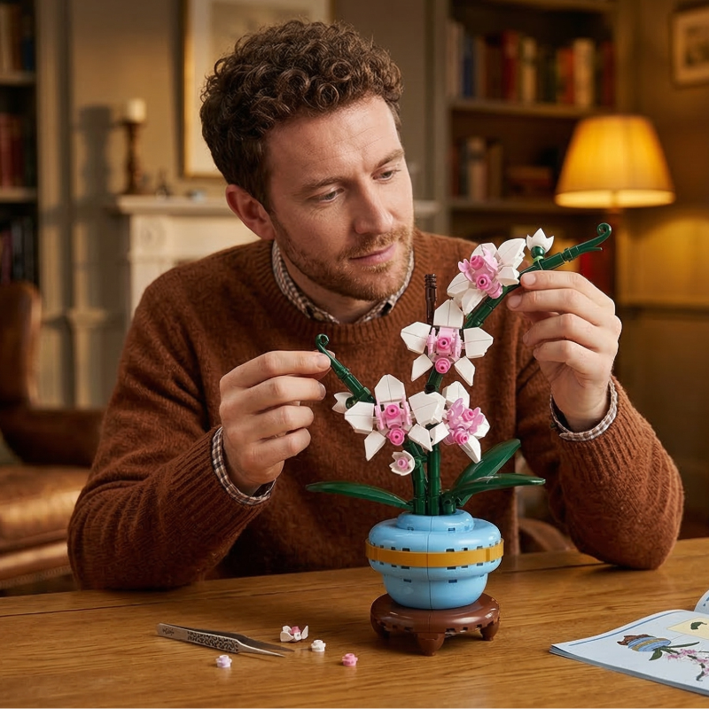 A man meticulously assembling the Mavirea Orchid building block set, highlighting the mindful DIY crafting experience of this eternal floral ornament.
